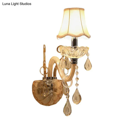 Traditional gold crystal wall sconce with fabric shade scalloped lampshade and dangling teardrop crystals for bedroom light