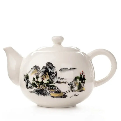 White ceramic dehua clay teapot with traditional east asian landscape design for decorbites dehua clay tea set