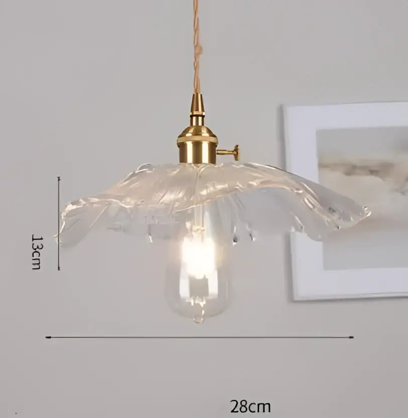 Translucent blue glass pendant light with brass fixture and exposed bulb ideal for dining room pendant lights decorbites blue glass