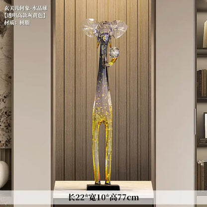 Translucent blue and yellow glass elephant floor decoration sculpture with golden speckles for living room decor