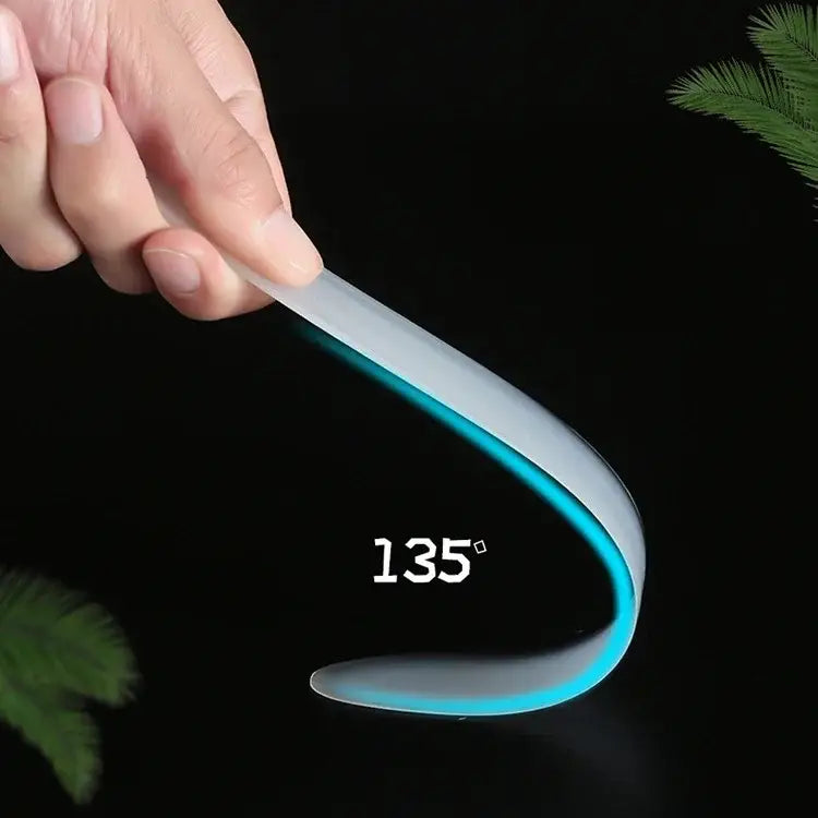 Translucent flexible silicone decorbites coconut opener tool with glowing blue edge and 135-degree bend for flesh extraction