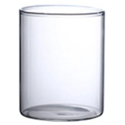 Clear glass hydroponic vase with a smooth cylindrical shape and rounded rim for home office or wedding tables