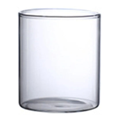 Clear glass hydroponic vase with smooth cylindrical shape and rounded rim for home office wedding table decor