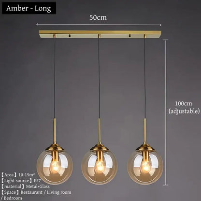 Amber-colored glass pendant light with brass accents and adjustable length in polished steel for dining room use