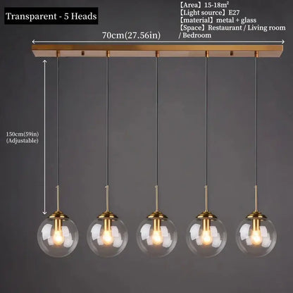 Modern pendant light with brass finish and five transparent glass globe shades in polished steel for dining room use