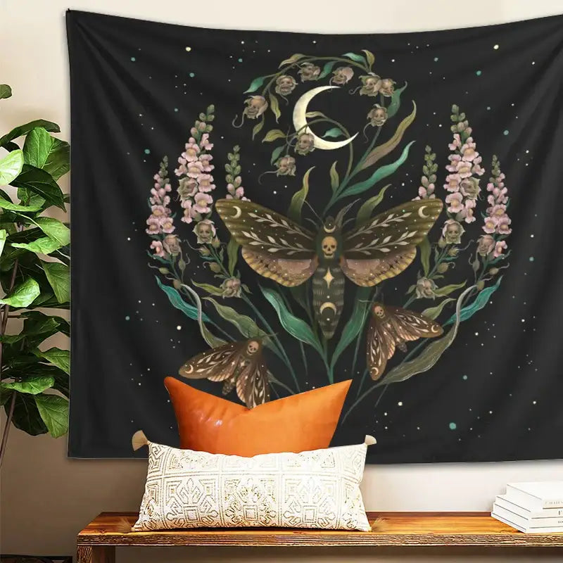 Black death’s head tapestry with central moth skull design, pink flowers, green vines, and starry night decorbites death’s head decor