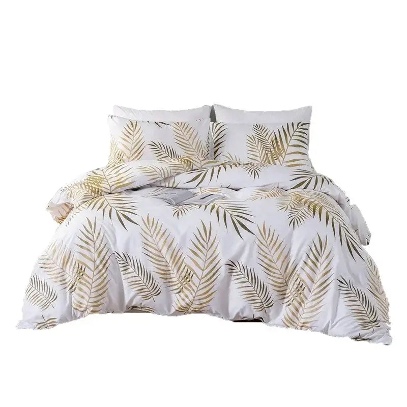 White duvet set with metallic gold and dark green tropical palm leaf pattern bedding solution by decorbites gold print