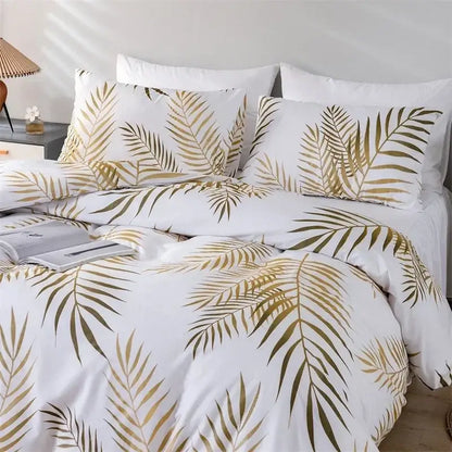 White duvet set with metallic gold and olive green tropical palm leaf pattern decorbites gold print bedding solution