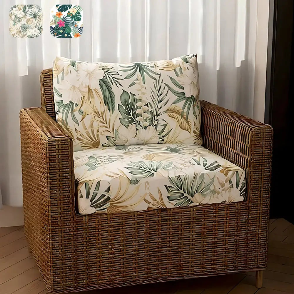 Wicker armchair with tropical green and cream brushed polyester microfiber cushions featuring leaf patterns