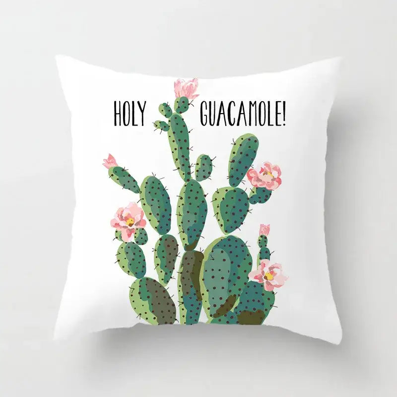 White throw pillow with green leaves decorative cactus design and holy guacamole text for living room home decor