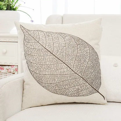 Beige linen cushion cover with detailed black leaf vein pattern featuring decorbites green plant leaves design