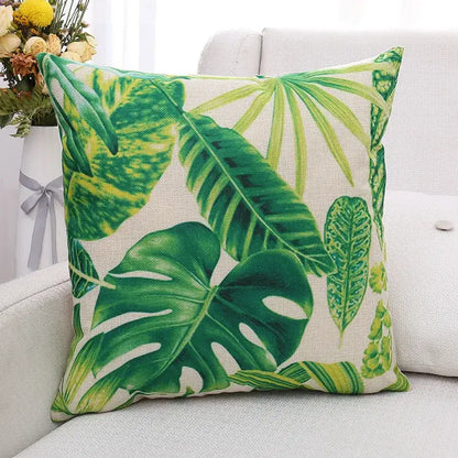 Green tropical leaf patterned square linen cushion cover featuring decorbites green plant leaves for living room decor