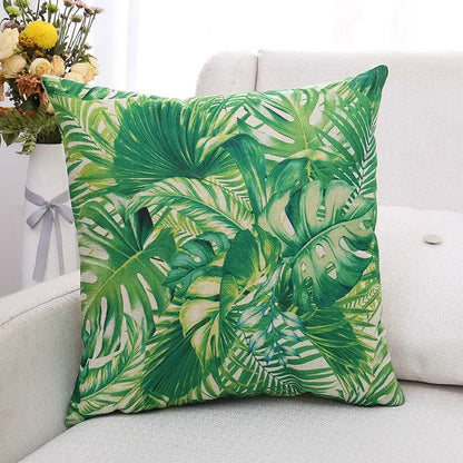 Green tropical leaf patterned linen cushion cover featuring decorbites green plant leaves for living room decor