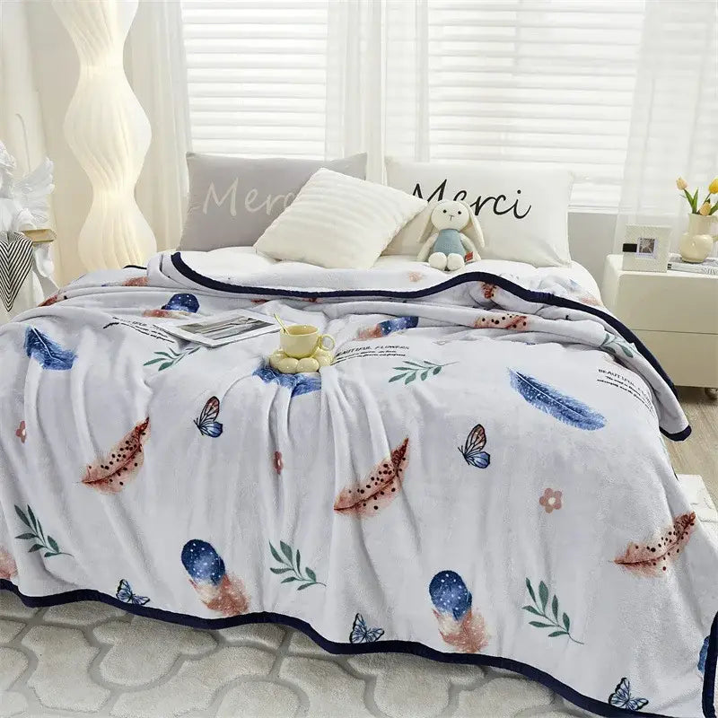White plush decorbites cozy flannel blanket with blue rust feather butterfly pattern and navy border for bedroom decor