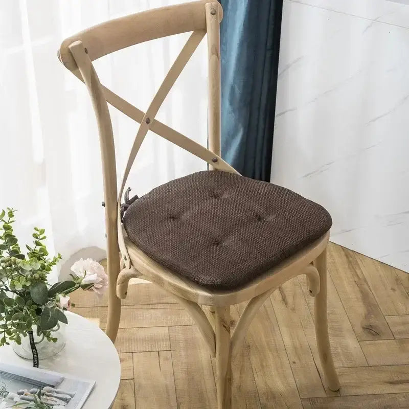 Brown tufted textured chair cushion designed for wooden cross-back decorbites dining chair for dining room use