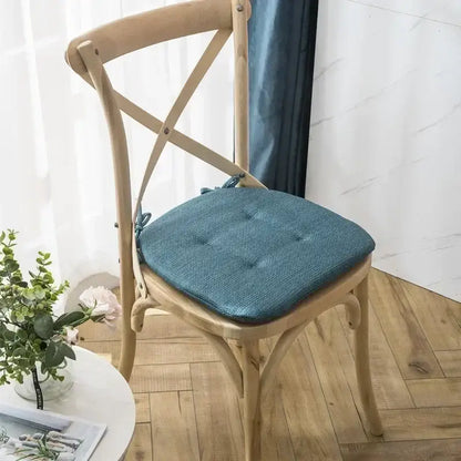 Teal tufted woven fabric chair cushion with tied side ties for decorbites dining chair and dining chair cushions