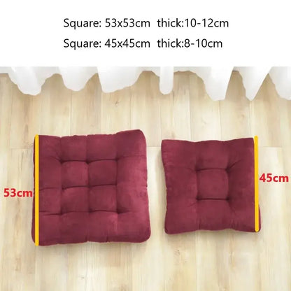 Two square plush burgundy tufted seat cushions with yellow trim made of corduroy for decorbites corduroy floor seat use