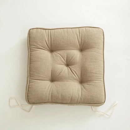 Beige linen decorbites button cushion with tufted square design and matching ties for living room decor