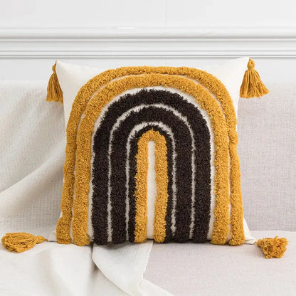 Cozy white cushion cover with textured hand-tufted rainbow design mustard yellow black tufted tassels decorbites boho style
