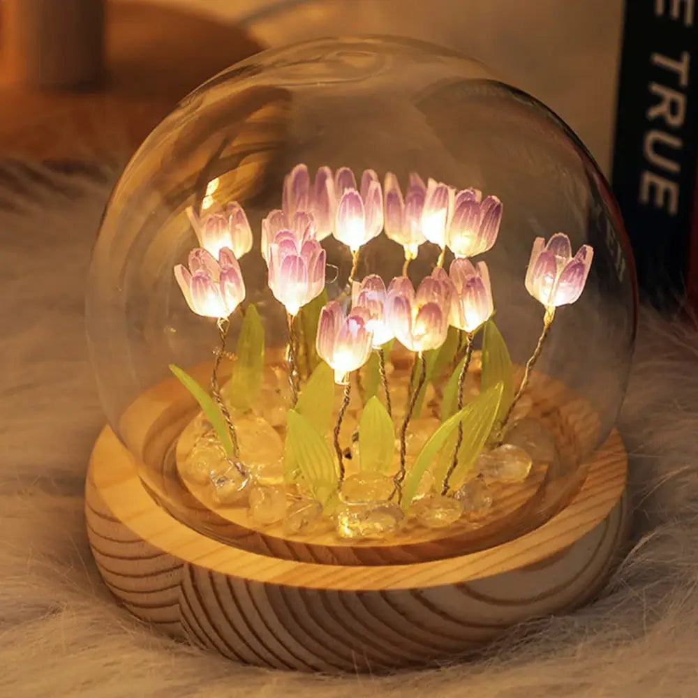 A decorbites tulip night light featuring illuminated purple glass tulips with green leaves on a wooden base