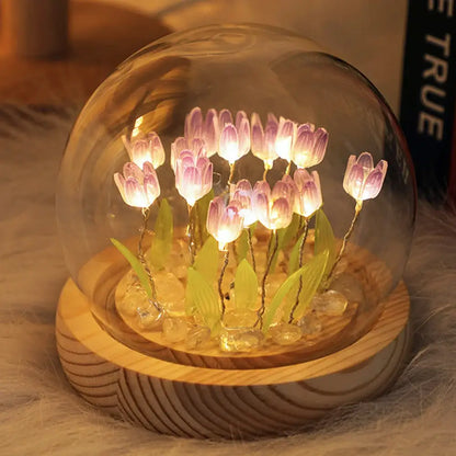 A decorbites tulip night light featuring illuminated purple glass tulips with green leaves on a wooden base