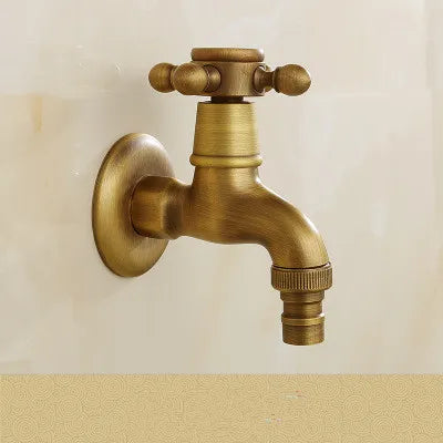 Antique brass vintage-style wall-mounted washing machine faucet with cross-handle and textured dragon carving