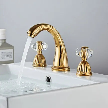 Tuqiu gold basin faucet with three gold-finished handles and crystal accents for hot and cold water use