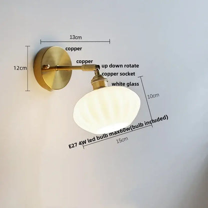 Vintage-style wall sconce with polished copper finish and white glass shade for decorbites blue glass wall decor