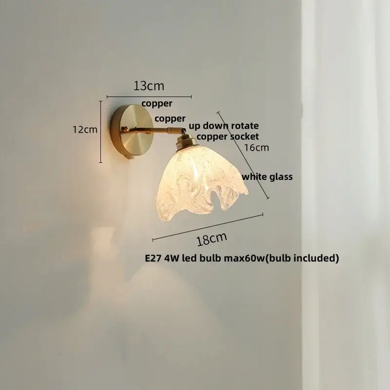 Copper wall sconce with white glass shade paired with decorbites blue glass wall sconce for staircase use