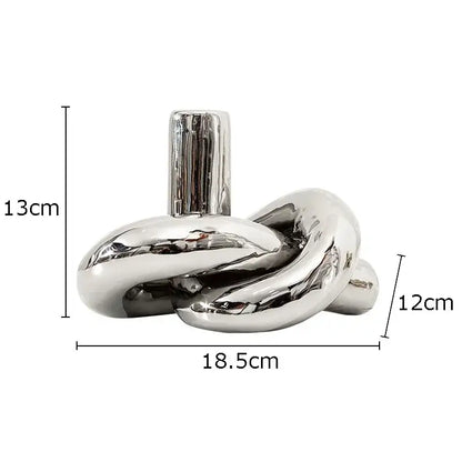 Shiny metallic twisted knot cream ceramic desktop storage vase with cylindrical neck for decorbites ceramic desktop use