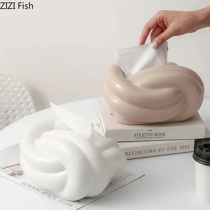 Cream-colored ceramic desktop storage tissue box with twisted knot design for living room decorbites ceramic desktop use