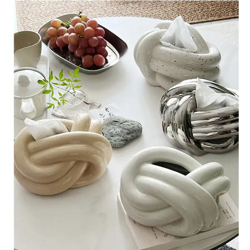 Cream-colored decorbites ceramic desktop storage tissue box with twisted knot design for living room desktop storage paper