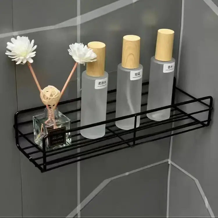 Black metal two tier corner storage shelves holding frosted glass bottles and diffuser for bathroom storage decorbites corner bathroom