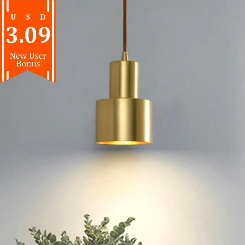 Two tier brass finish pendant light with gold-toned cylindrical design and warm diffused illumination for dining room decorbites brass finish