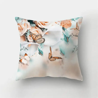 Square throw pillow with vibrant butterfly flower watercolor design of peach roses and orange monarchs on cream decorbites butterfly flower pillow case