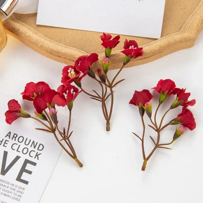 Vibrant red cherry blossom decorbites artificial flowers with delicate petals and green stems for living room decor