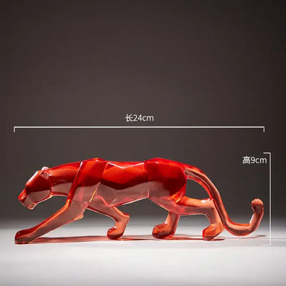 A translucent red glass panther figurine with a sleek geometric design for decorbites leopard cheetah animal sculptures