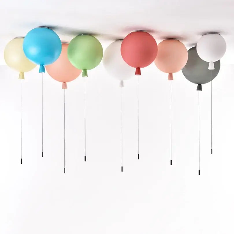 Vibrant glossy balloon pendant light in pastel colors with spherical design ideal for children’s bedroom installation method