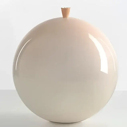 A smooth glossy beige ceramic pendant light with a wooden knob showcasing installation method for childrens bedroom