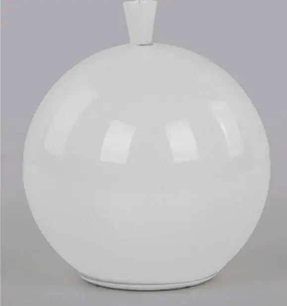 White glossy ceramic vase with rounded body and small rectangular neck beside vibrant glossy balloon pendant light installation method for childrens bedroom