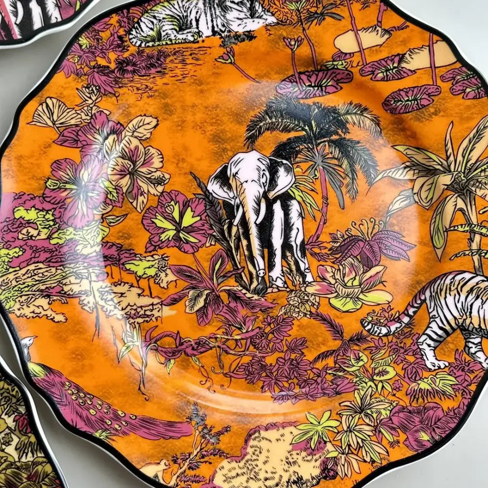 Vibrant orange decorbites jungle flower bone dining plates set featuring detailed jungle scene with elephant and tigers