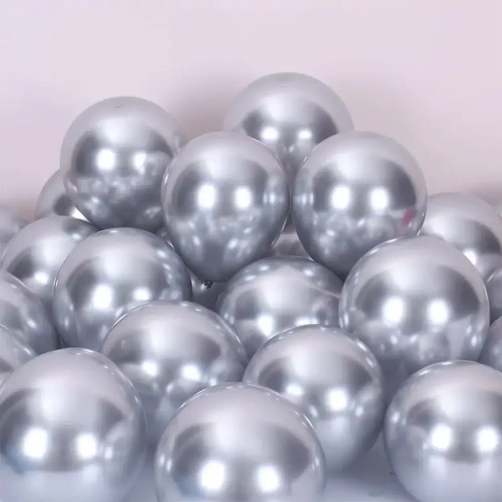 Shiny metallic silver latex confetti balloon set piled together for vibrant metal latex confetti party decor
