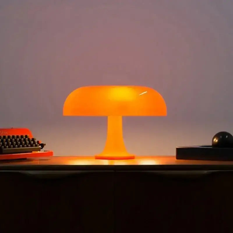 Vibrant orange mushroom desk night light with smooth translucent plastic body ideal as bedhead night light