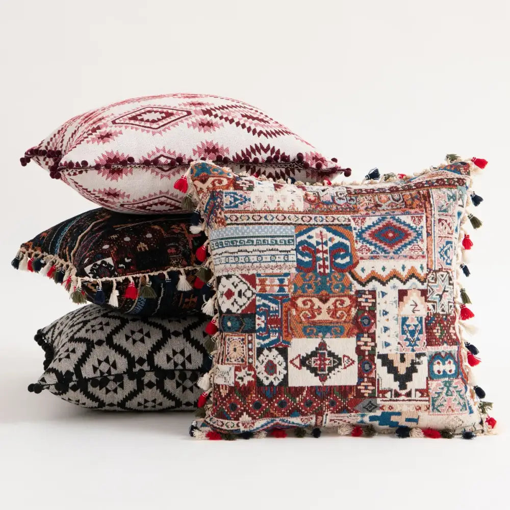 Vibrant patchwork ethnic boho throw pillow cover with geometric tribal patterns and colorful tassels for living room decorbites decor