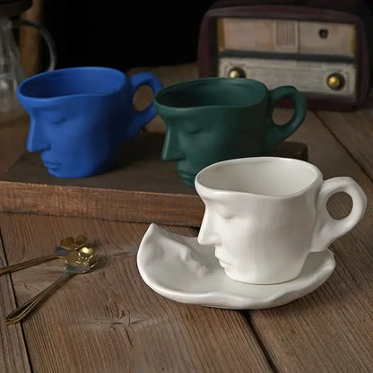 White ceramic face-shaped teacup with serene expression and matte finish in decorbites frosted ceramic face mug set