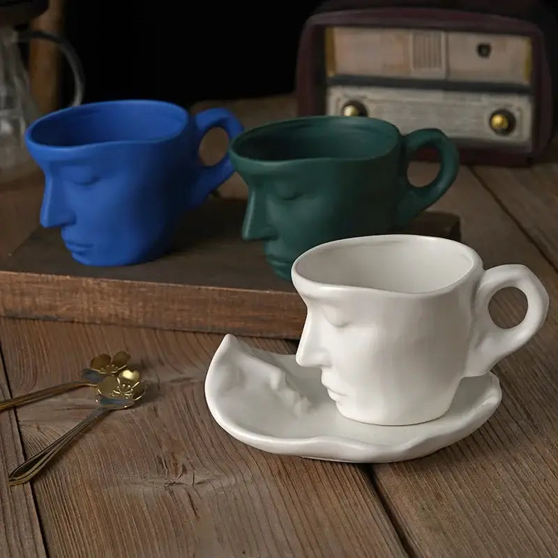 White ceramic face-shaped teacup with serene expression and matte finish in decorbites frosted ceramic face mug set