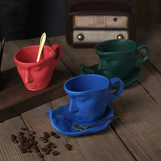 Vibrant red frosted ceramic face mug with closed eyes and integrated handle from decorbites mug set for kitchen use