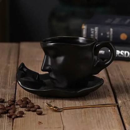 Black ceramic frosted ceramic face mug set by decorbites with sculpted features for kitchen and dining room decor