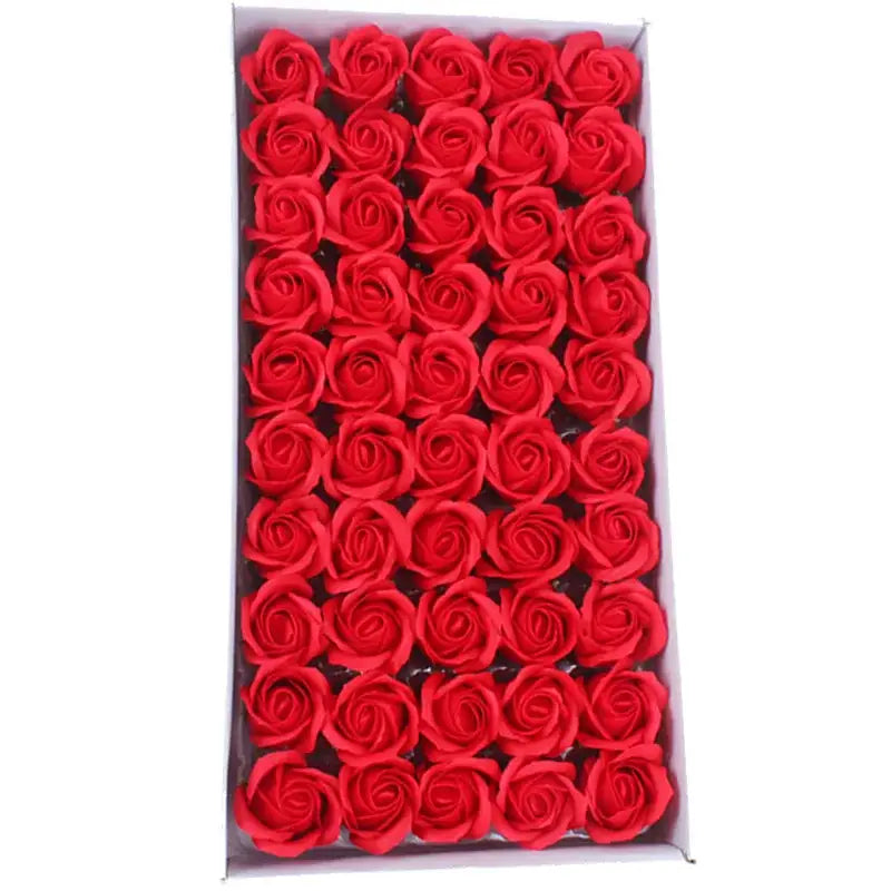 A vibrant red foam rose bath flower set by decorbites featuring intricately detailed soap flowers for bathroom decor