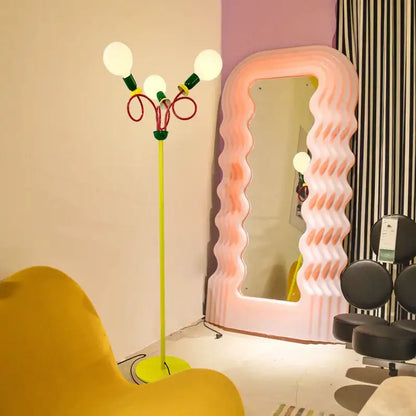 Vibrant neon green decorbites art led floor lamp with three white bulbs and colorful twisted metal arms for living room decor